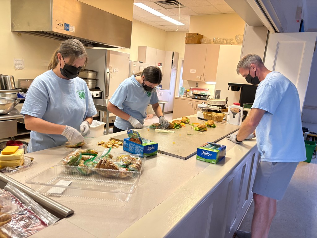 meal fairies volunteers at CJSTUF in Richmond, VA making sandwiches